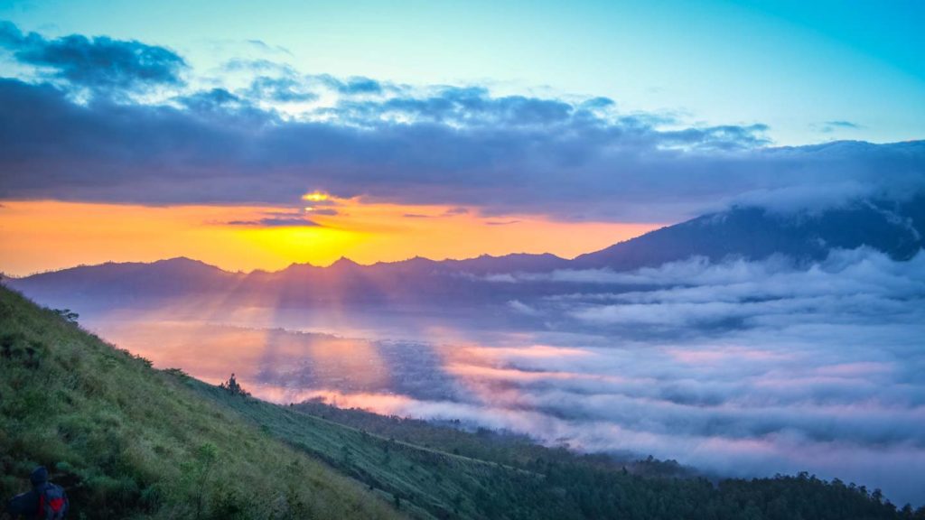 Climbing mount Batur in Bali at sunrise
